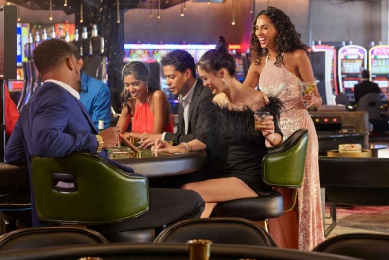 Group Playing Blackjack in Orchid Gaming & Smoking Patio®
