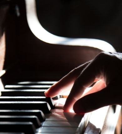 Stock Image of Hands Playing Piano