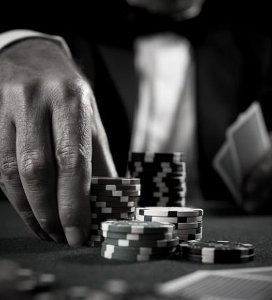 Man Placing a Poker Bet