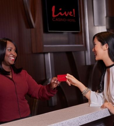 Couple Getting A Live! Rewards® Card