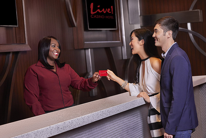 Couple Getting A Live! Rewards® Card