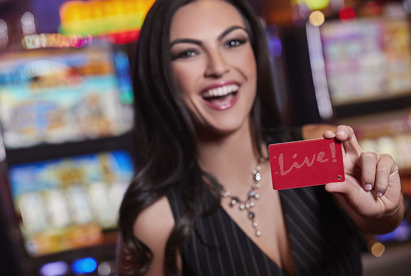 Woman Holding Classic Live! Rewards Card